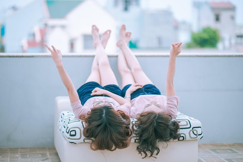 Friends holding hands